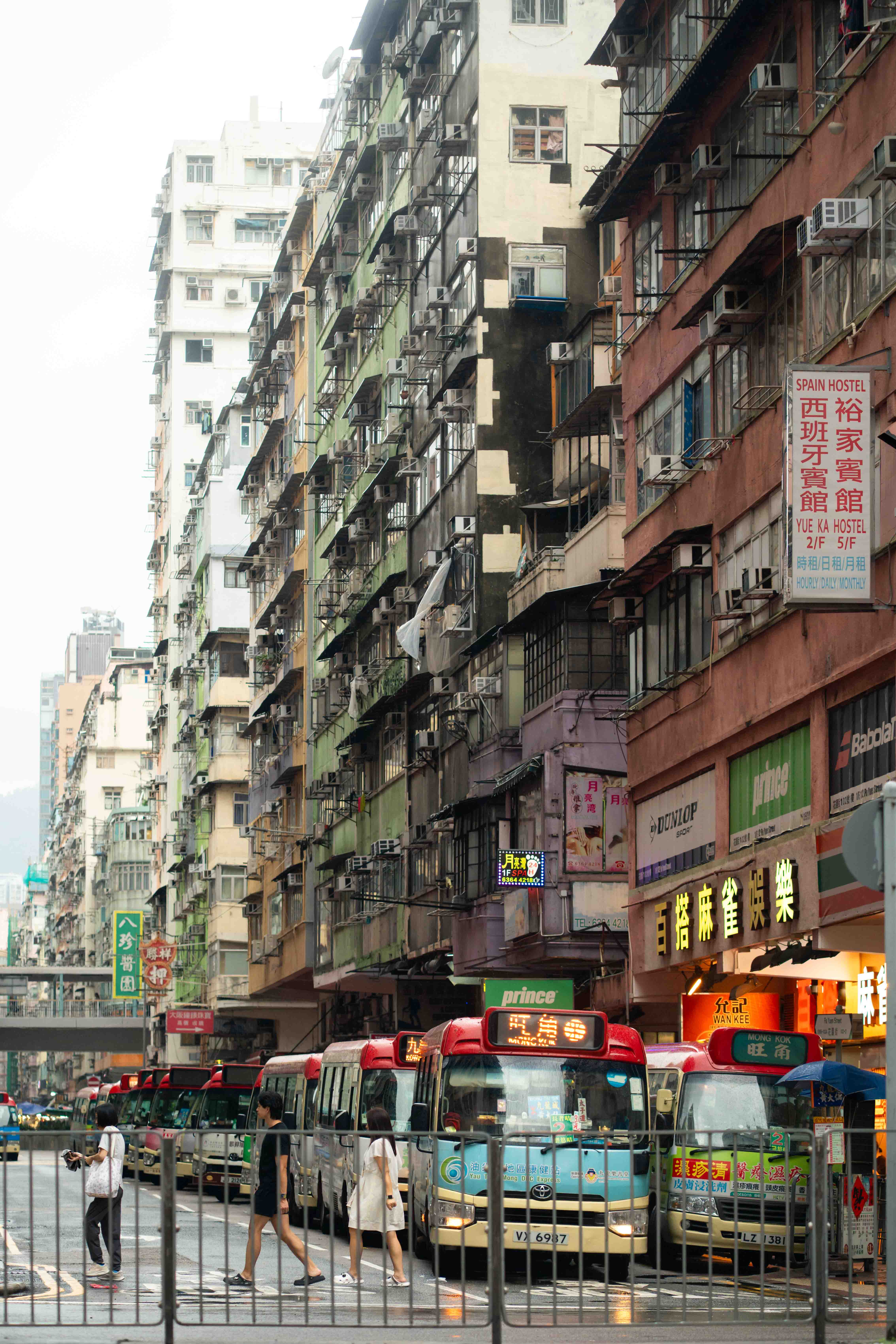 Hong Kong minibus with backdrop of apartments