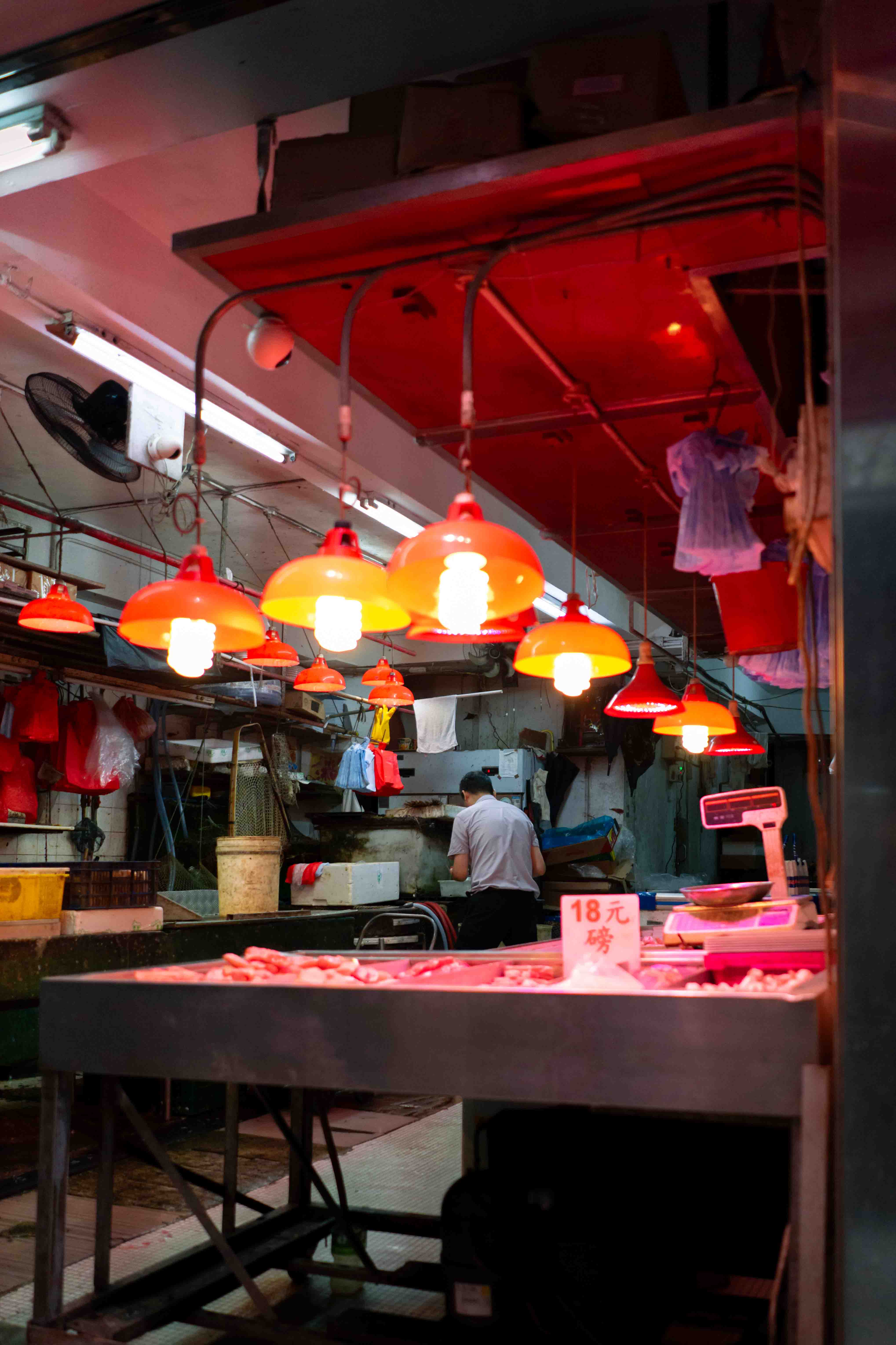 Meat stall with red lights